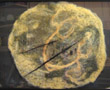 Yellow abstract wall art that is reminiscent of a koi
